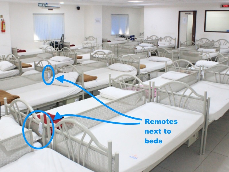 Patient bed remote controllers